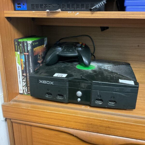 Original Xbox console with Fifa 2003 game and remote control.