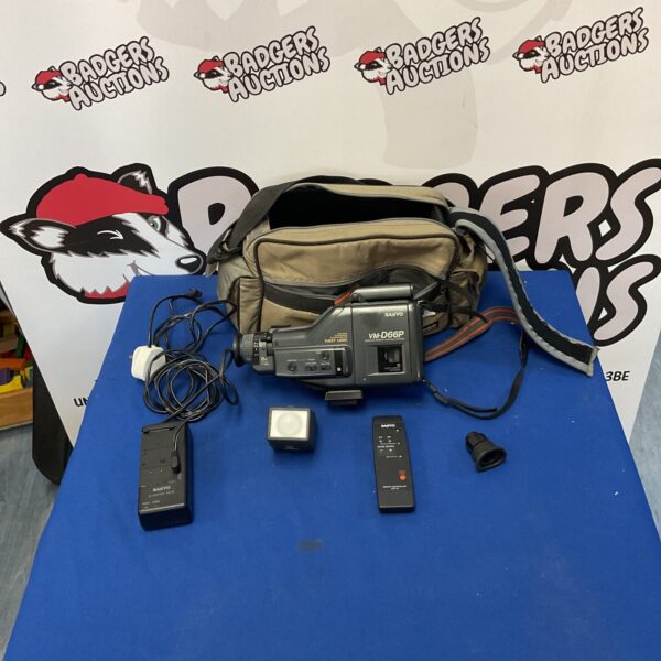 Vintage Sanyo VM-D66P camcorder with flash attachment.