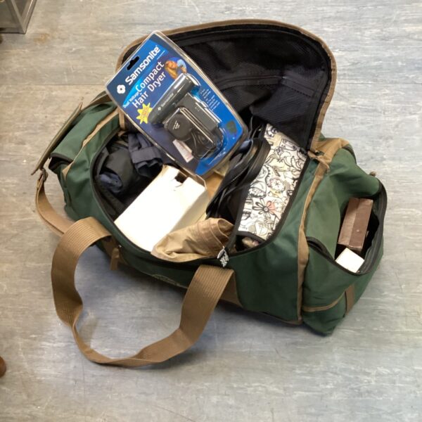 Vintage Mountain Horse holdall with Samsonite hair dryer and contents.