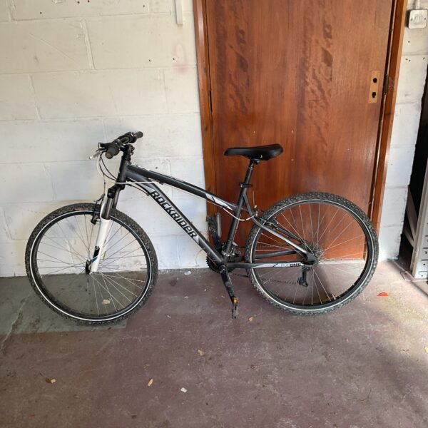 Rockrider mountain bike with aluminum frame, ideal for outdoor adventures.