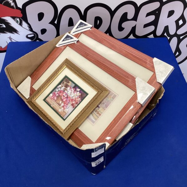 Two new gilt picture frames for displaying photos or artwork.