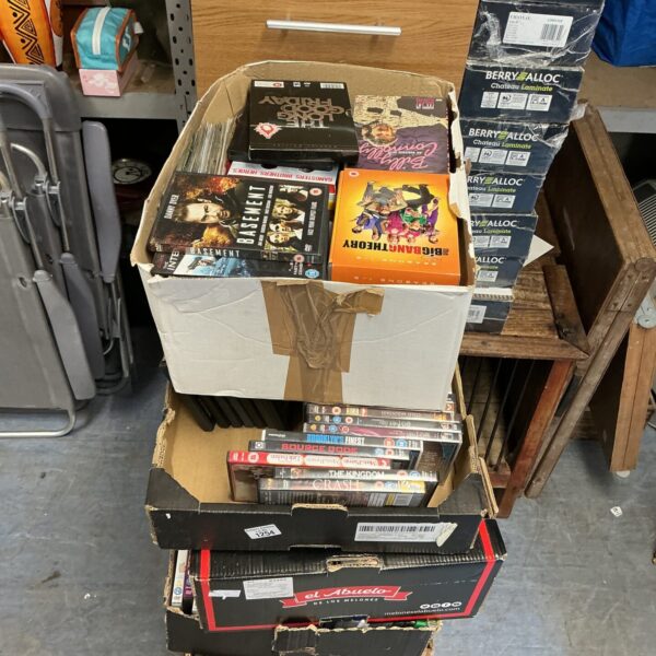 Large collection of assorted DVDs for home entertainment and movie lovers.