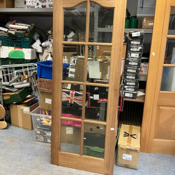 Vintage full glass panel door measuring 78 inches by 30 inches.