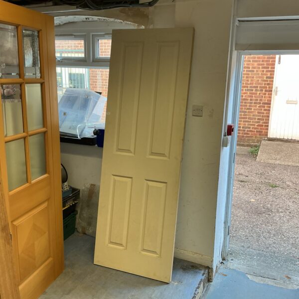 Vintage solid panel door measuring 78x30 inches.