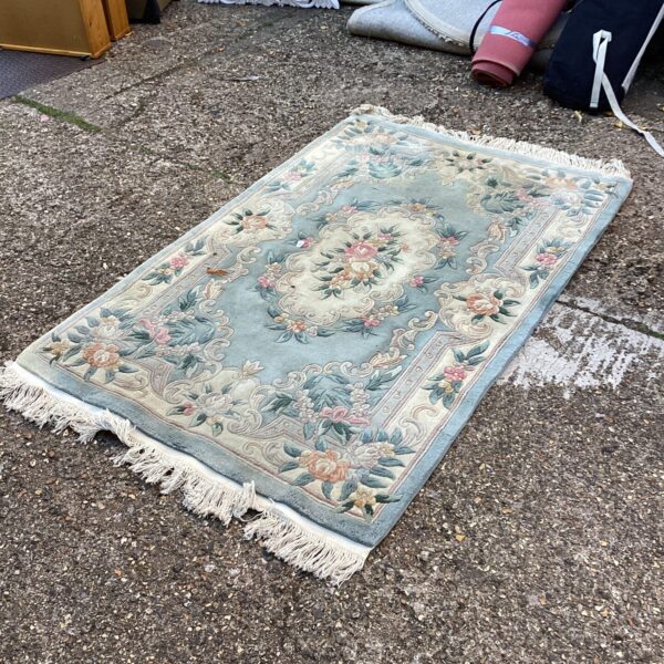 Vintage blue floral wool rug, 7x4ft, 20th century design.