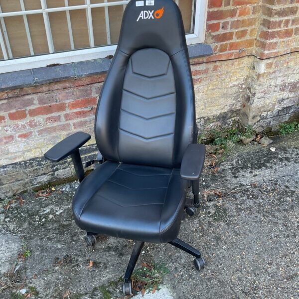 Front view of a black ADX gaming chair with adjustable armrests.