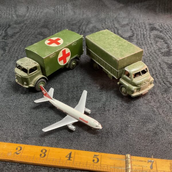 Vintage Dinky Toys military vehicles lot including ambulance and lorry.