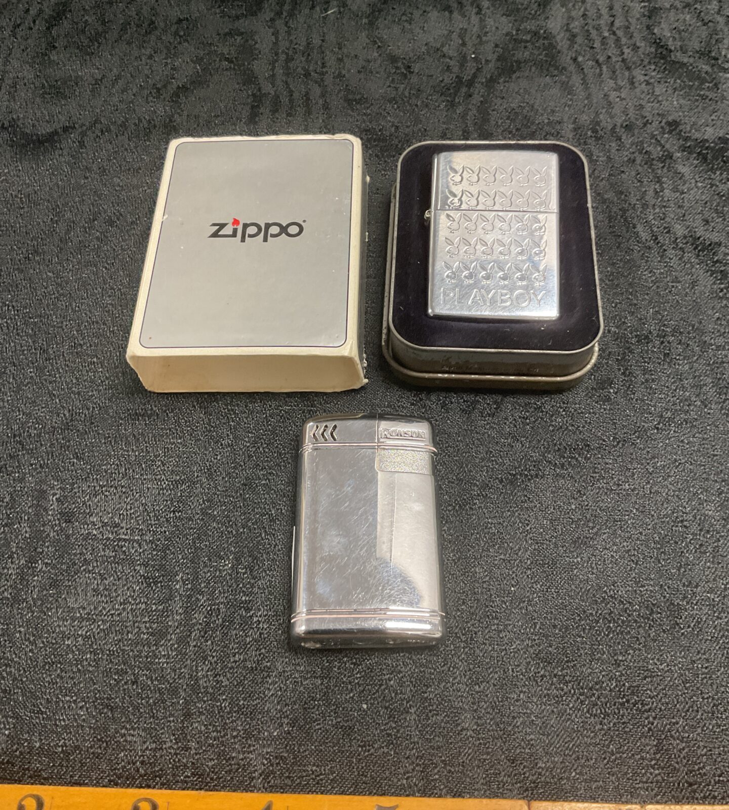 Zippo playboy lighter in tin and Ronson gas lighter