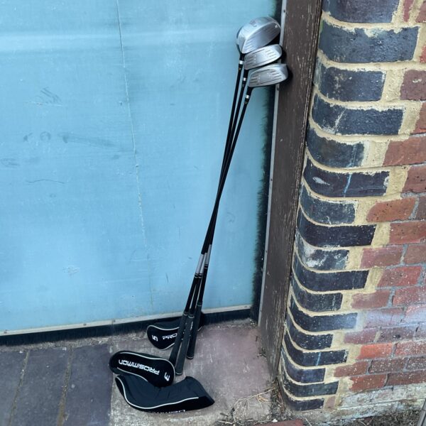 Prosimmon X30 golf clubs including driver and fairway woods.