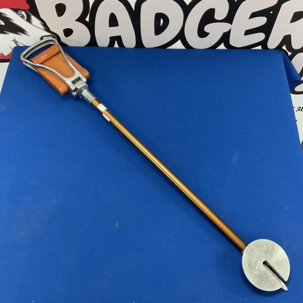 Vintage Featherweight shooting stick with leather seat for hunting.