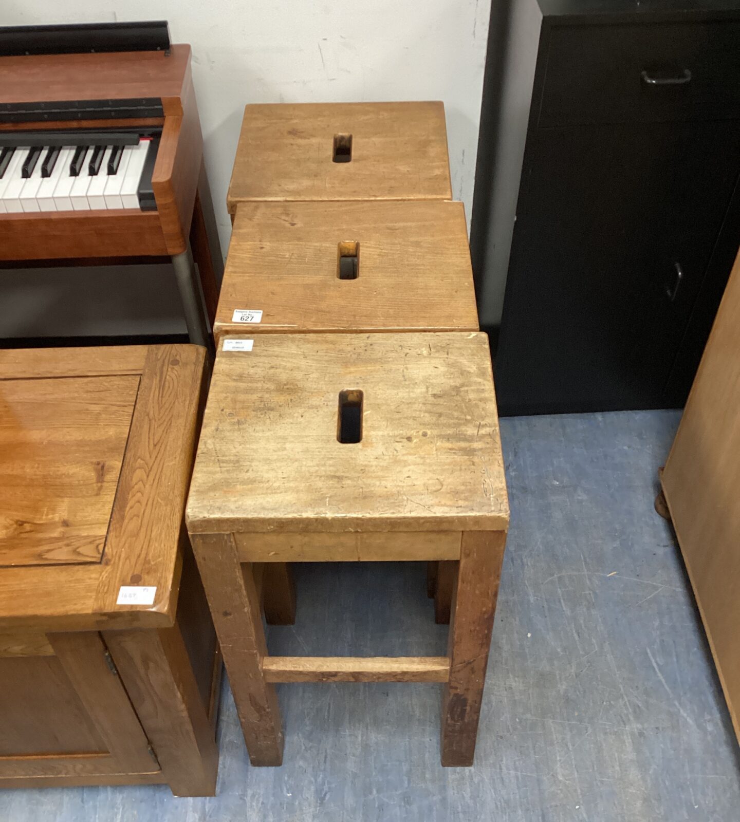 Three vintage school laboratory stools