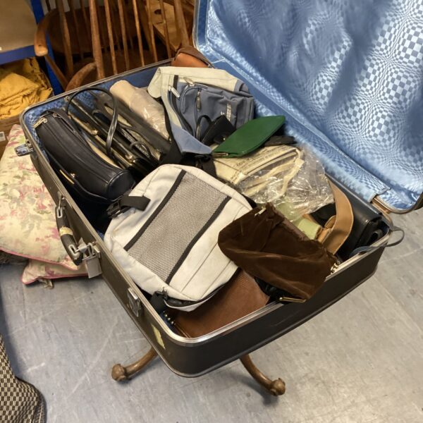 Antler suitcase full of bags
