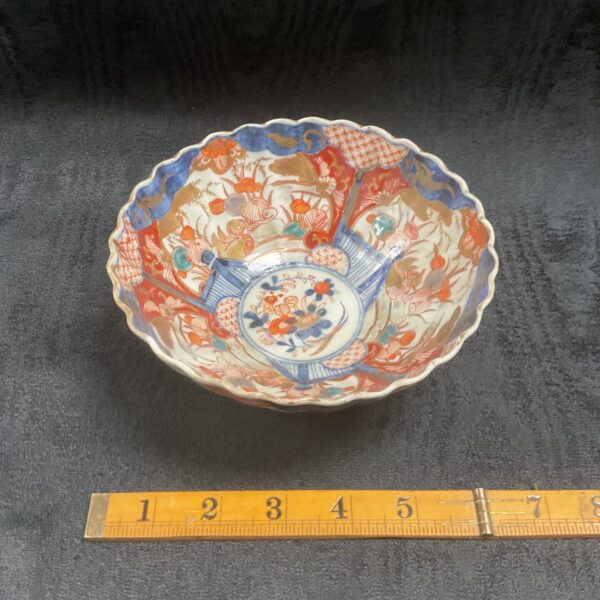 Antique Japanese Imari bowl with colourful floral design.
