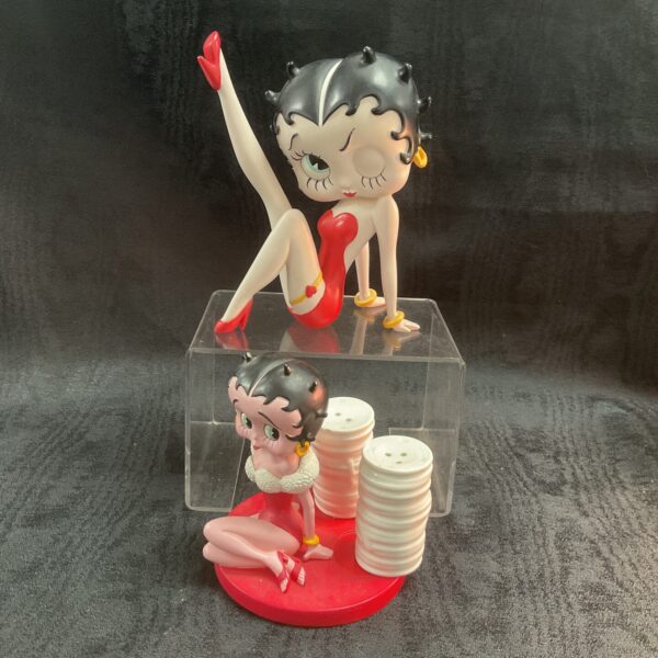 Vintage Betty Boop cruet set with ceramic figurine and condiment containers.