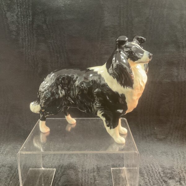 Vintage Beswick Border Collie dog figurine, detailed pottery collectible.