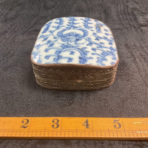 Antique Chinese blue and white porcelain lidded box with metal frame.