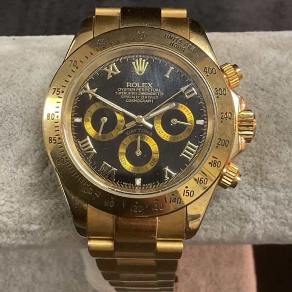 Gold-tone reproduction Oyster Perpetual quartz wristwatch.