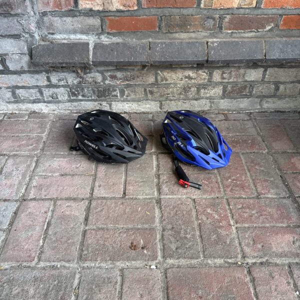 Two Prowell Nightsafe adult cycle helmets for cycling safety.