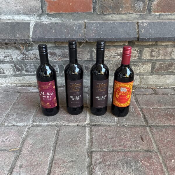 Assorted bottles of mulled wine for festive winter enjoyment.
