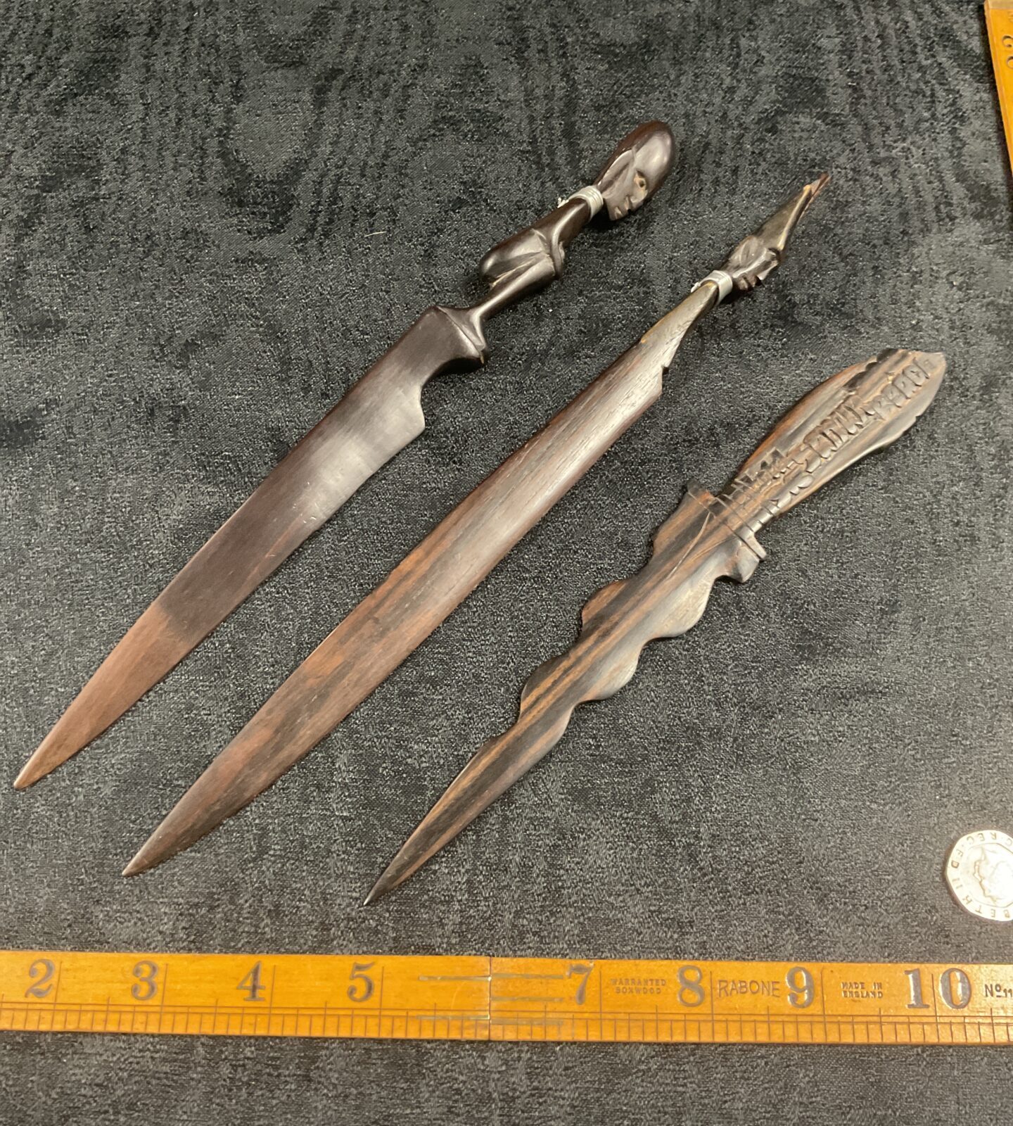 Three African carved wood letter openers