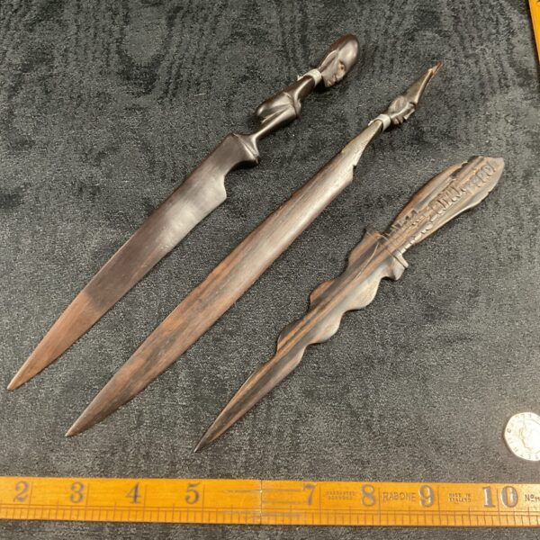 Three African carved wood letter openers