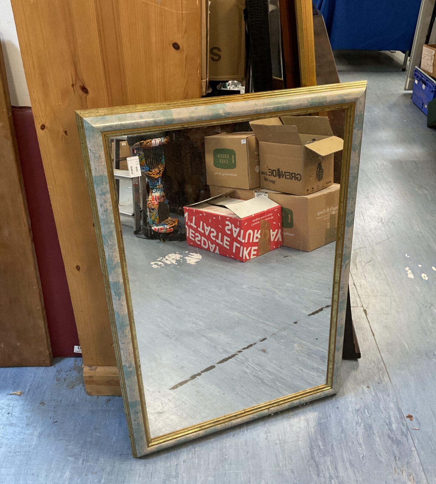 Modern gilt framed mirror 85x59cm