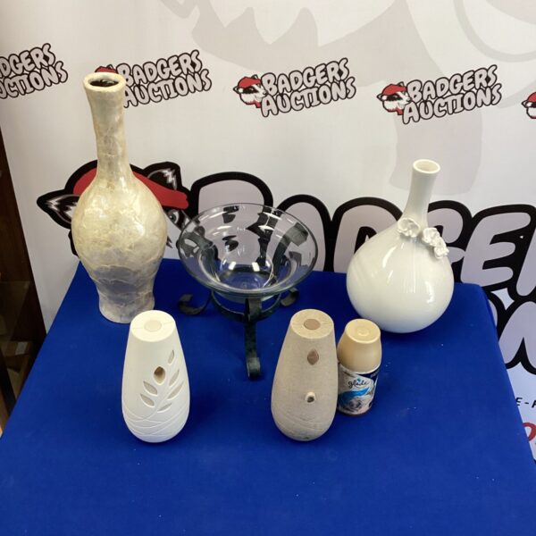 Two tall vases with other items
