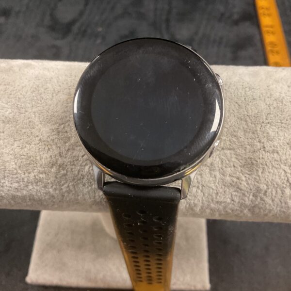 Close-up of the black Samsung Galaxy Watch face and band.