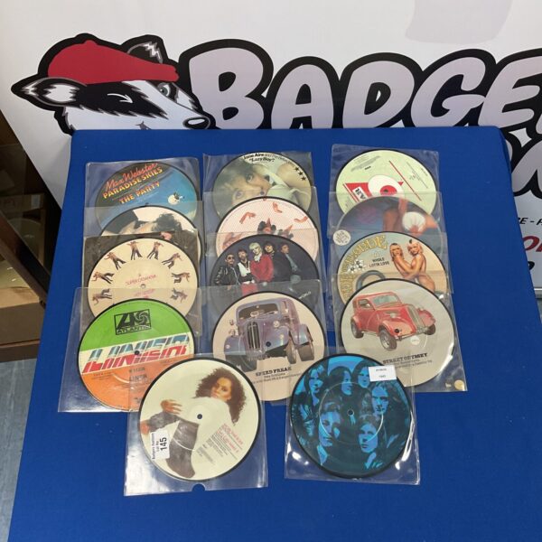 Bundle of colourful 7 inch picture discs vinyl records.