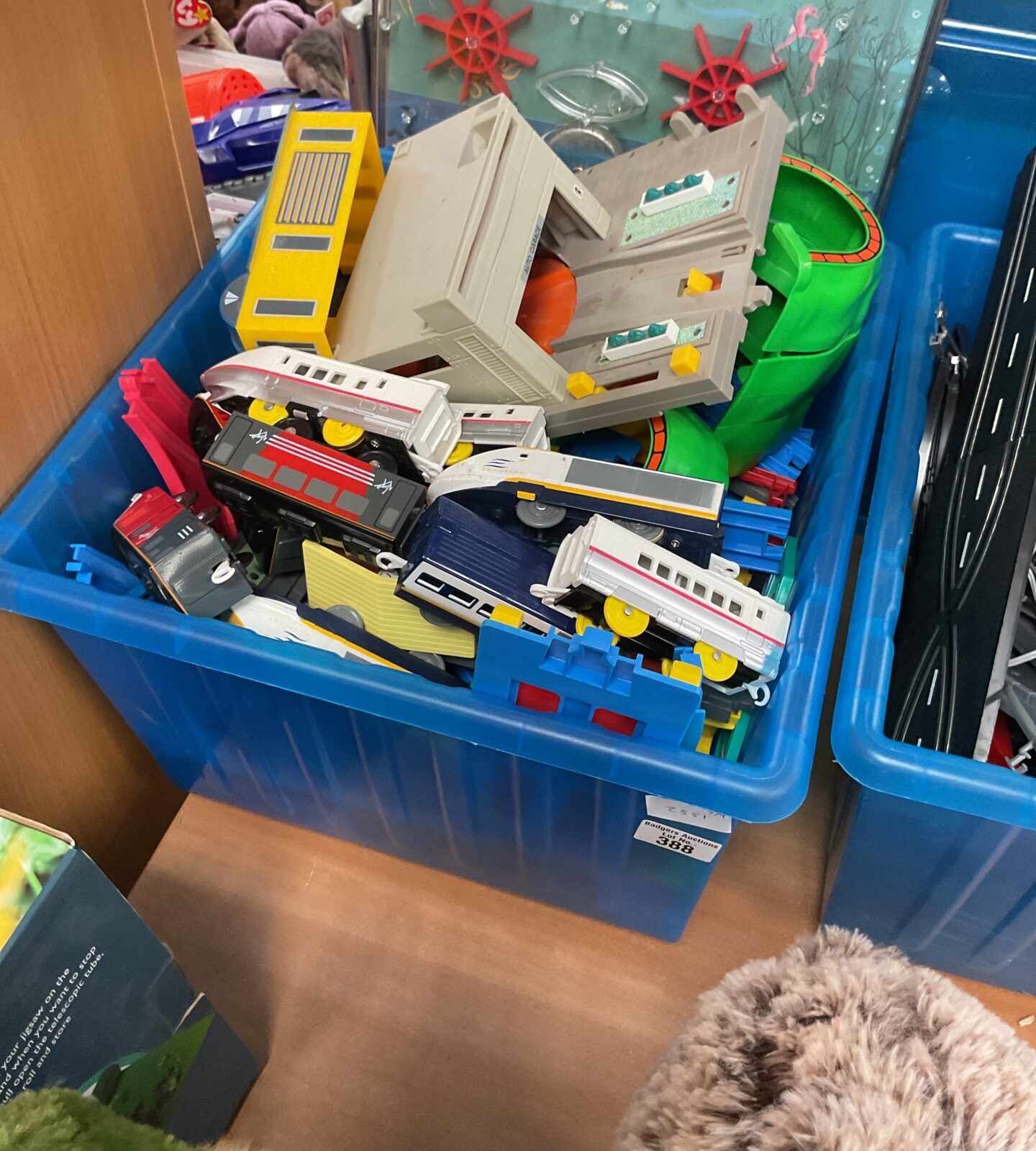 Box containing retro 90s Tomy Playsets And Vehicles