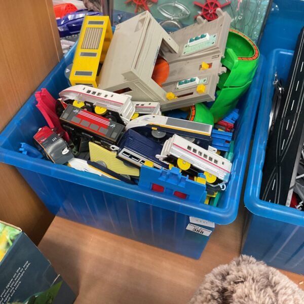 Box containing retro 90s Tomy Playsets And Vehicles