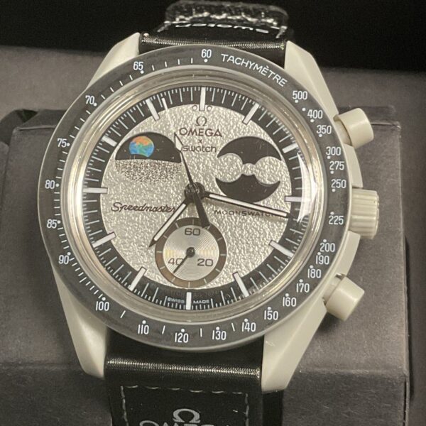 Close-up of the Omega Swatch MoonSwatch Mission to the Moon watch dial.