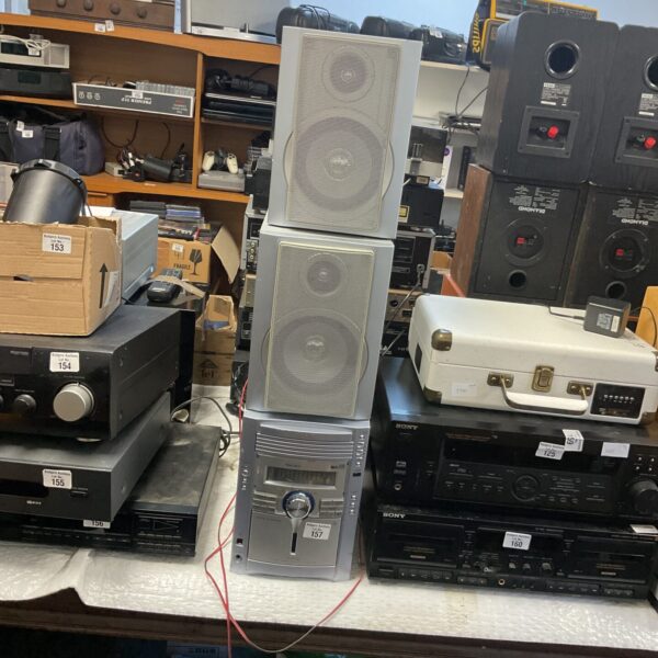 Vintage Sharp XL-MP150 micro system with speakers, retro audio equipment.