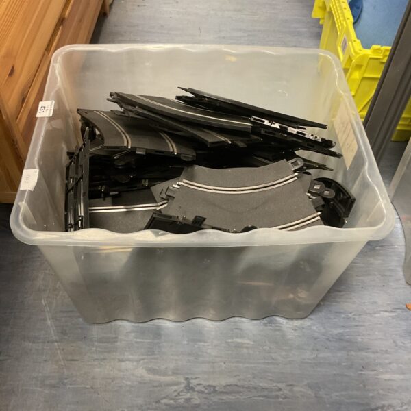Collection of Scalextric track pieces for building a racing circuit.
