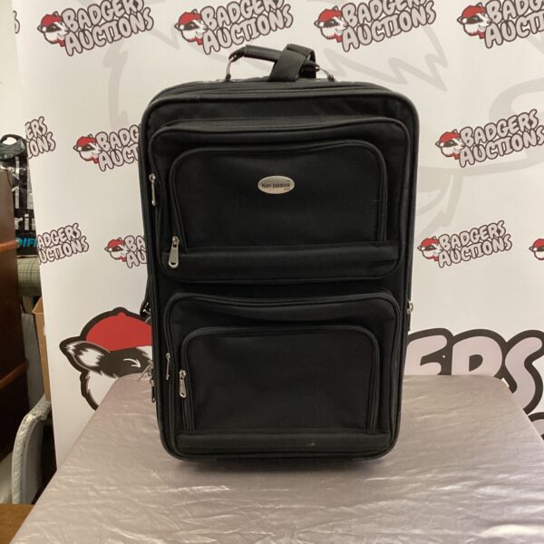 Vintage Marc Johnson USA rolling suitcase with extendable handle.