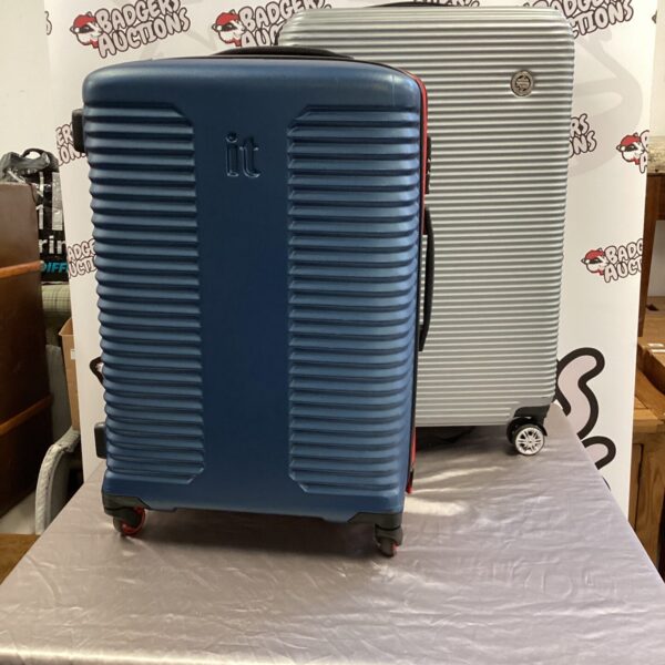 Blue It luggage suitcase with extendable handle, travel ready.