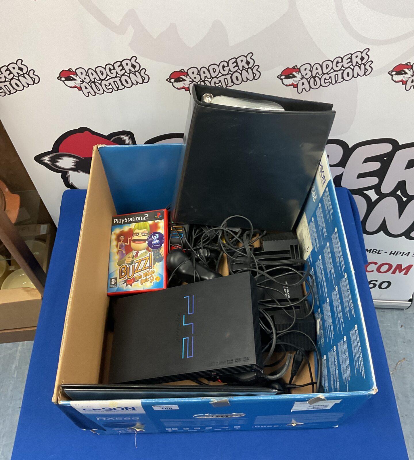 Sony Playstation 2 console with accessories and games