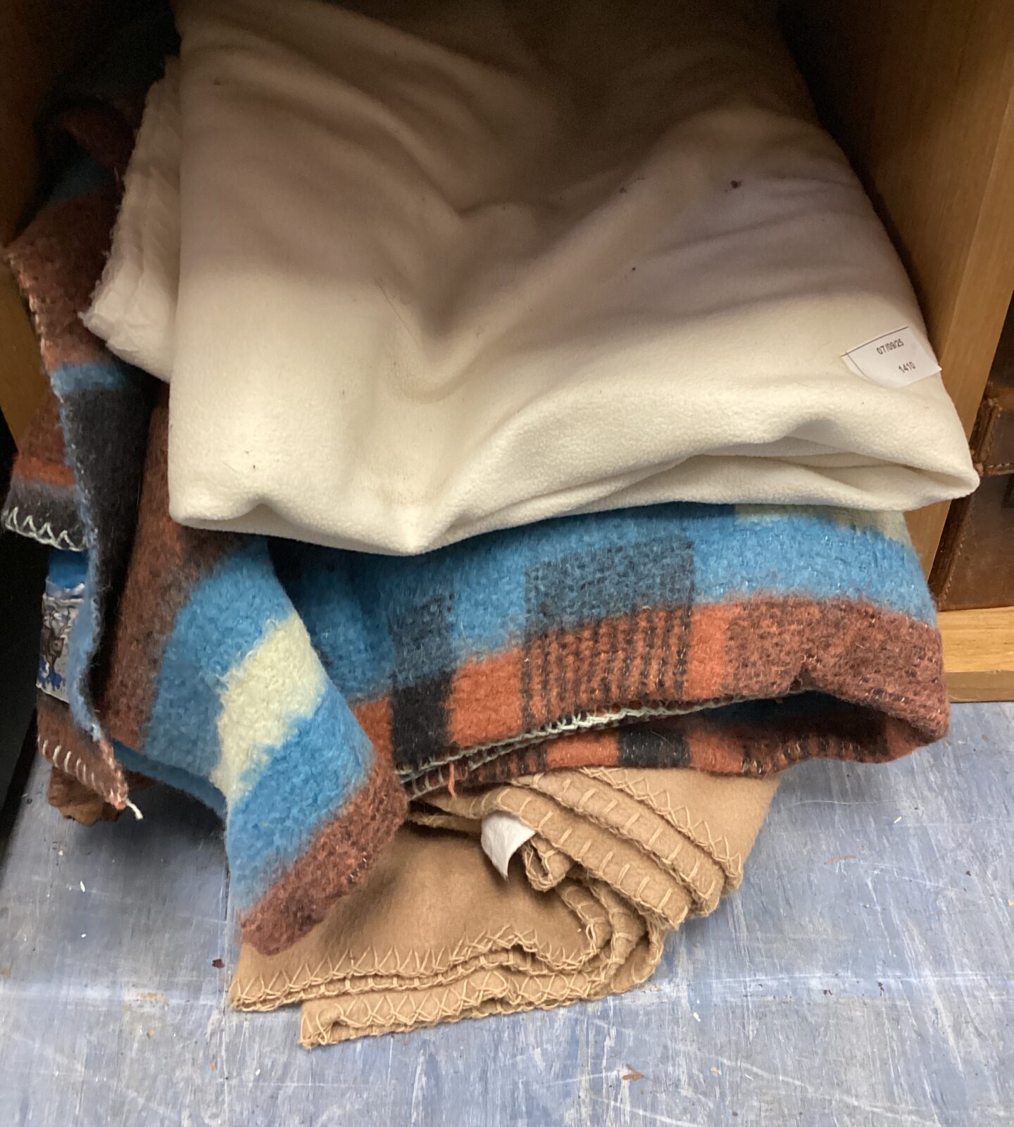 Three woollen blankets