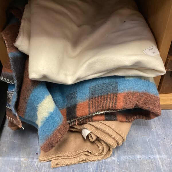 Three woollen blankets