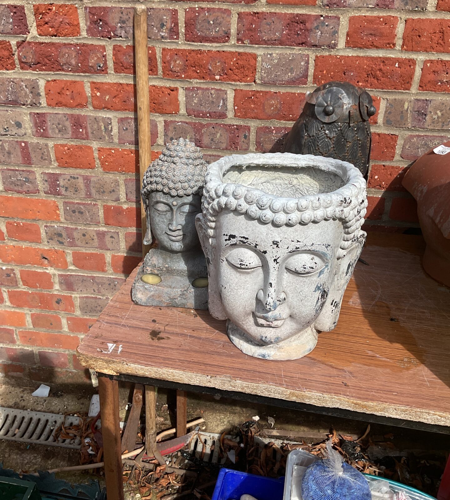 Two Buddha garden ornaments