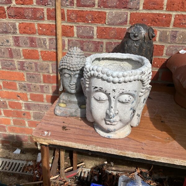 Two Buddha garden ornaments