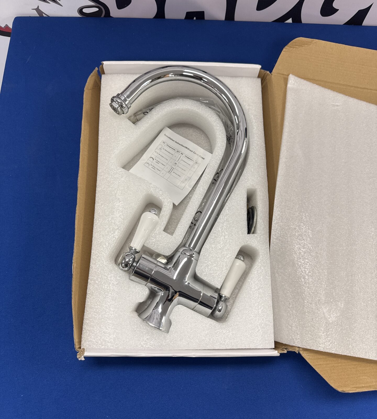 New chrome kitchen mixer tap