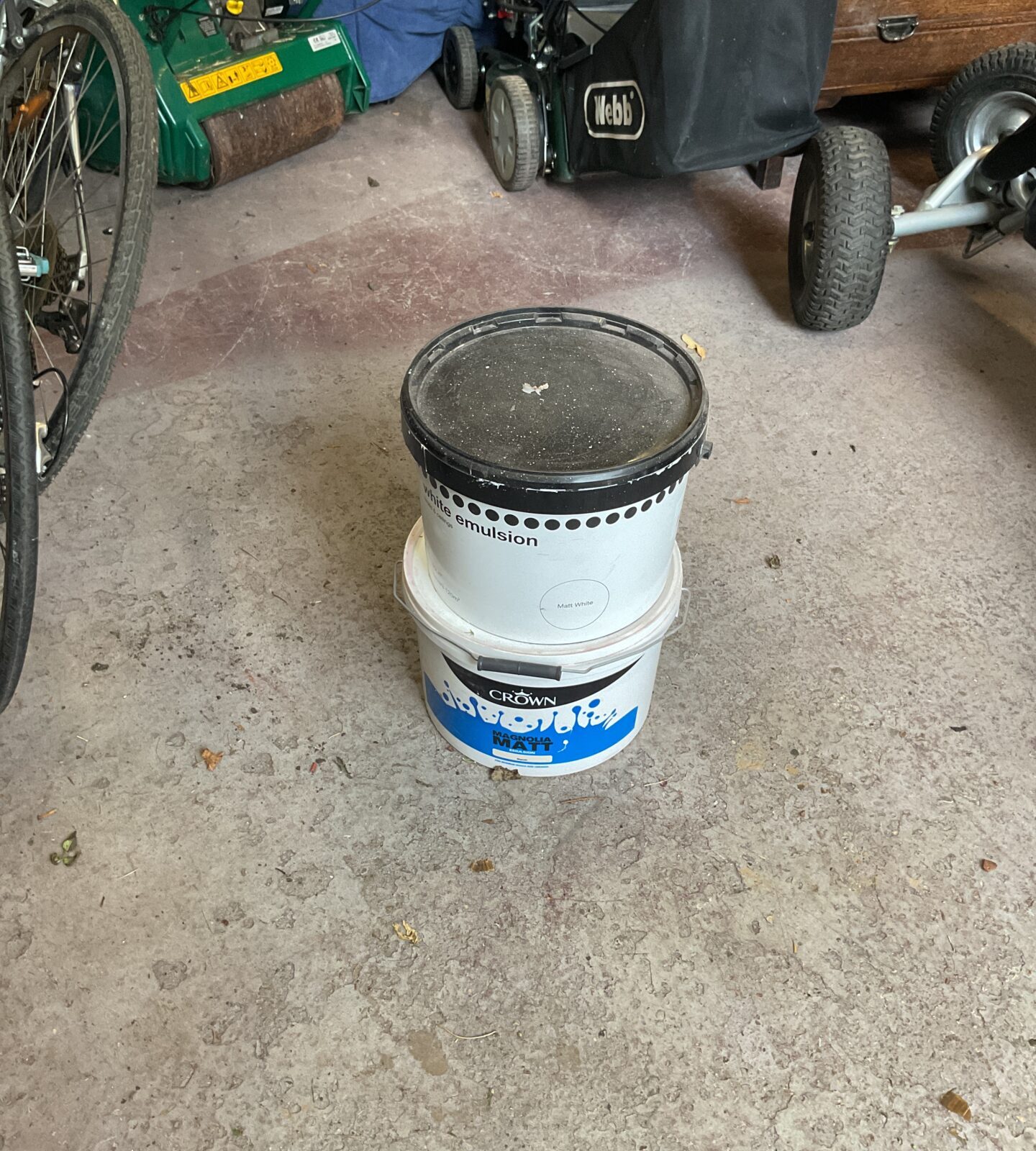 Two tubs of emulsion paint