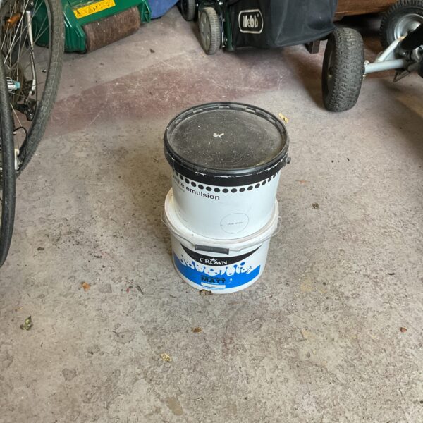 Two tubs of emulsion paint