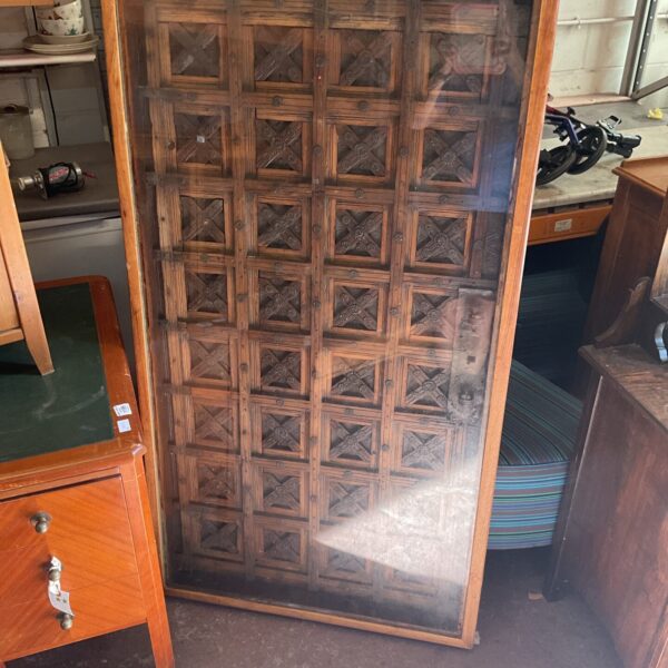 Vintage 3’x3’ glass topped coffee table with carved inlay (one leg in need of repair)