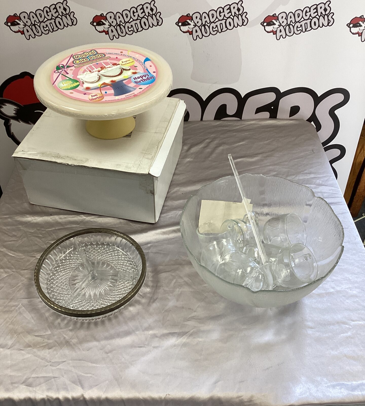 Magical rotating music cake stand with punch bowl & glasses