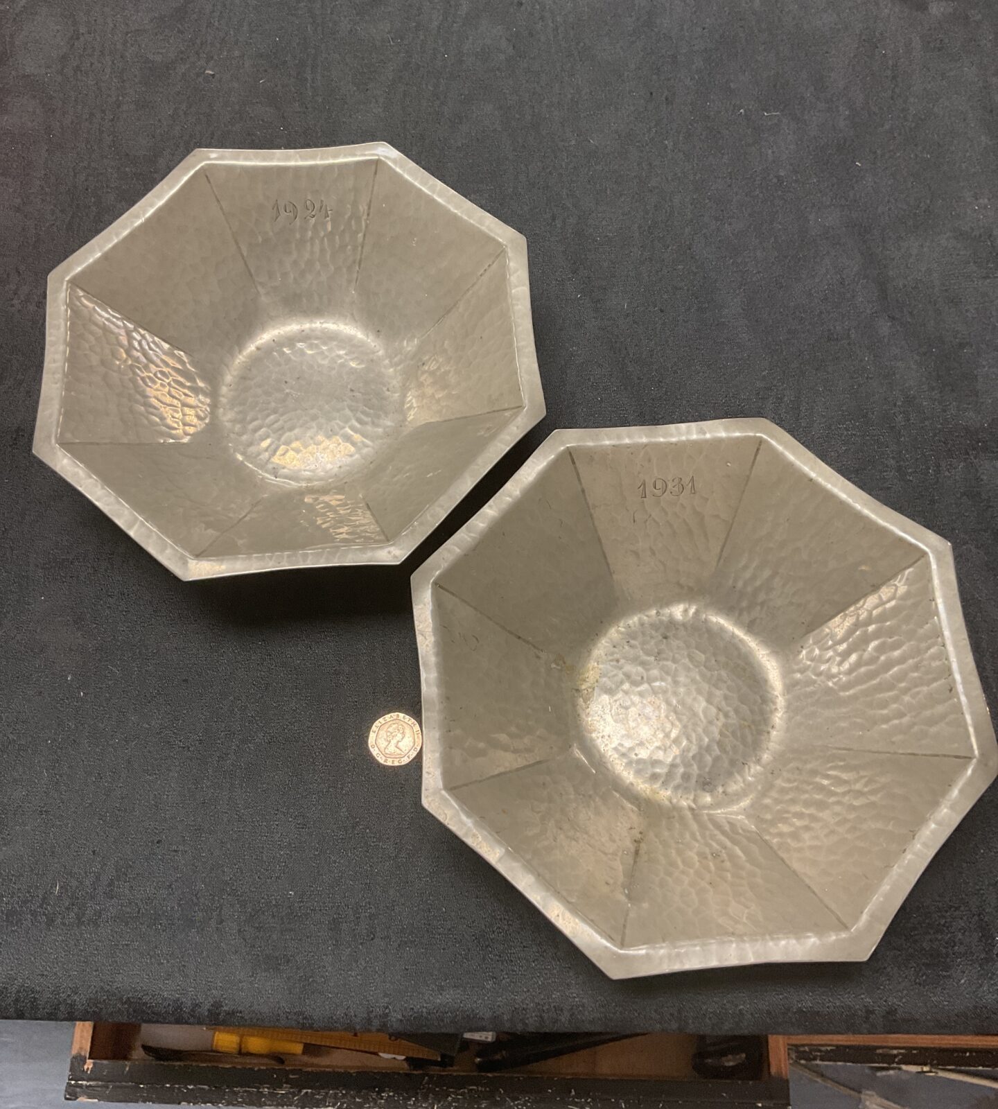 Leon provins Belgium a pair of art deco hammered pewter octagonal bowls signed and dated 1924 and 1934