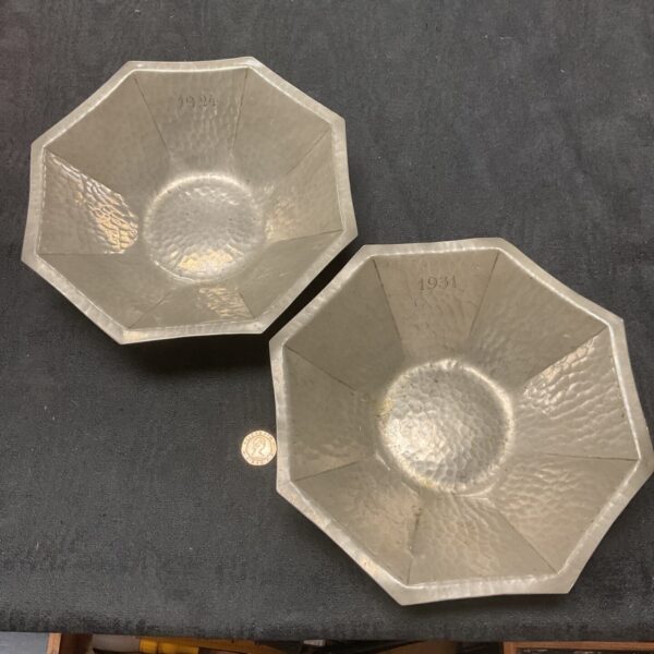 Leon provins Belgium a pair of art deco hammered pewter octagonal bowls signed and dated 1924 and 1934