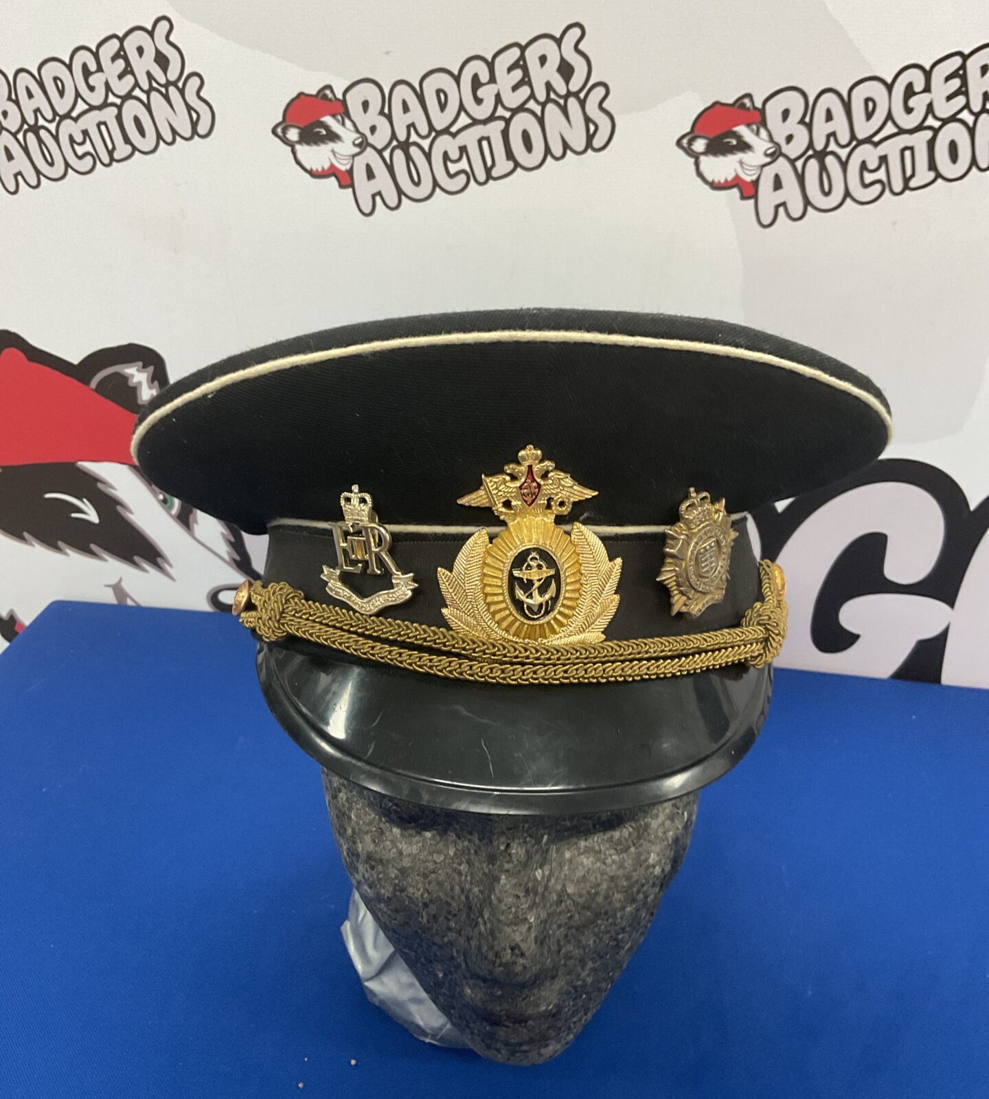Russian navy dress hat with two British army badges