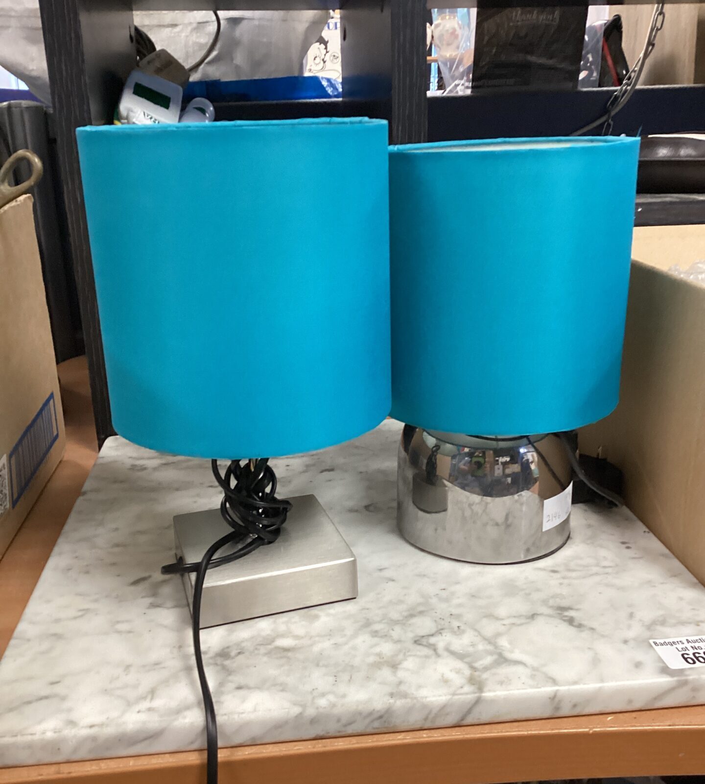 Two touch activated table lamps with blue shades